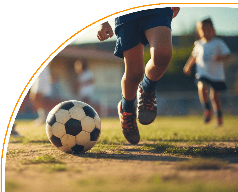 A group of kids playing soccer on the field.